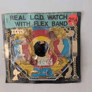 Vintage Gold Tone Vending Machine Toy Bracelet, Necklaces, And Keychains Display